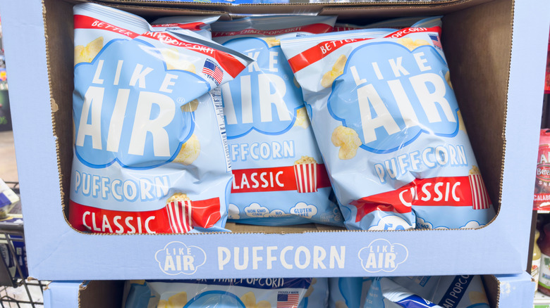 A view of several boxes of Like Air Puffcorn on display at a store