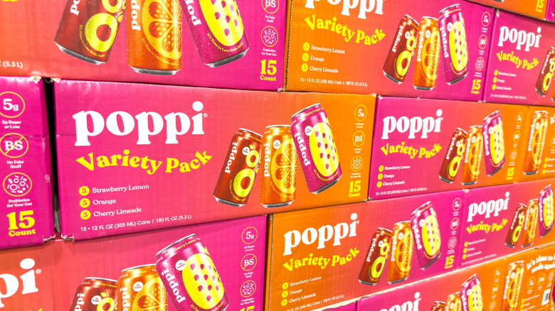 Variety packs of Poppi Soda stacked together