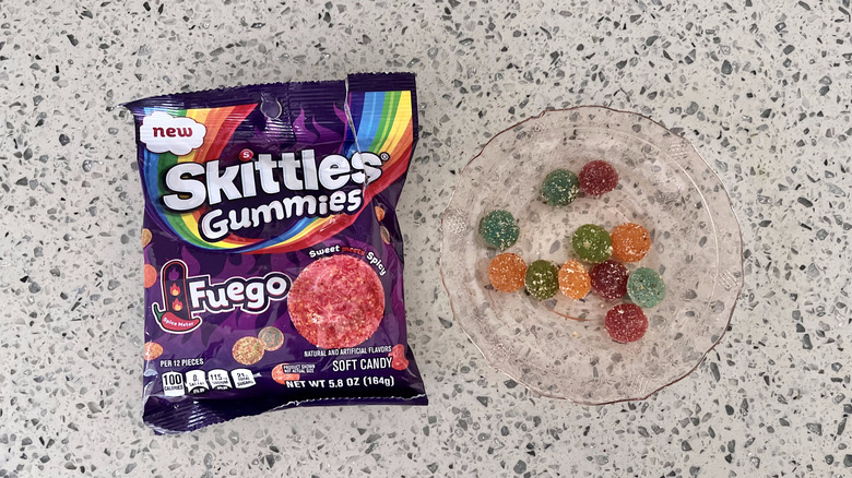 Skittles Gummies Fuego candies on a plate