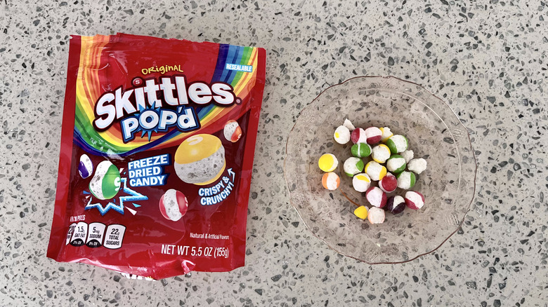 Skittles Pop'd candies on a plate