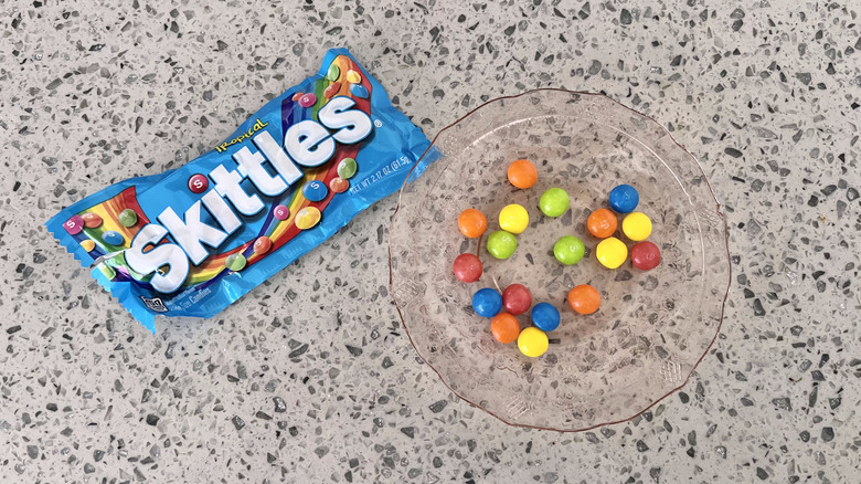 View of tropical Skittles on a plate