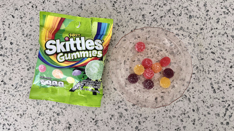 Sour Skittles Gummies on a plate