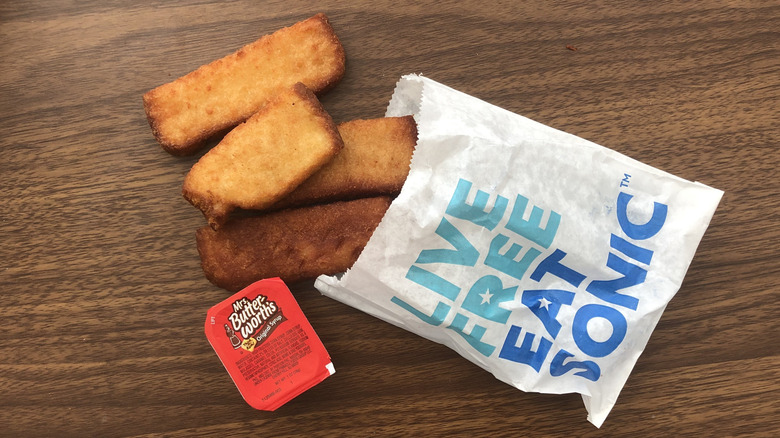 Sonic French toast sticks in wrapper with syrup