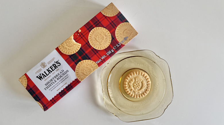 One Walker's All-Butter Shortbread cookie on a small plate