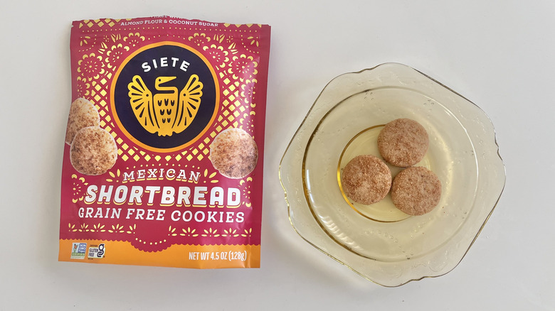 Three Siete shortbread cookies on a plate