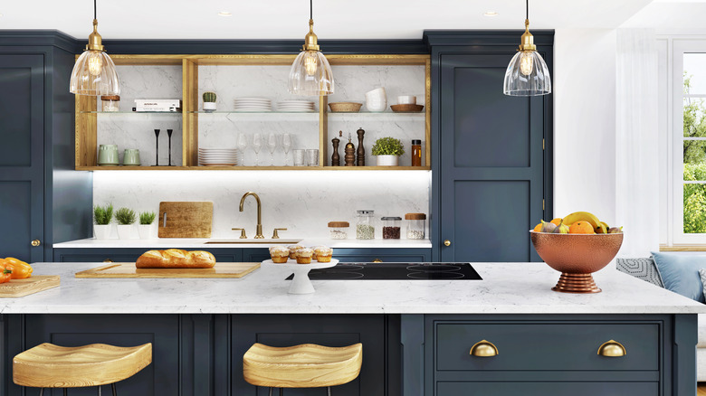 Bright and modern kitchen with deep navy blue cabinets