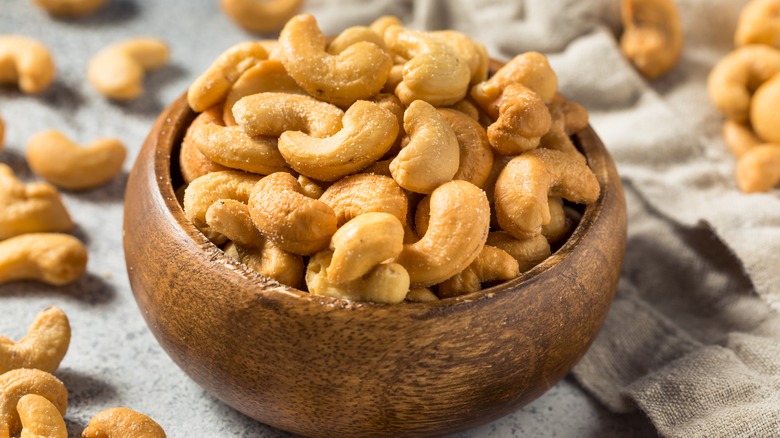 Cashews in wooden bowl 