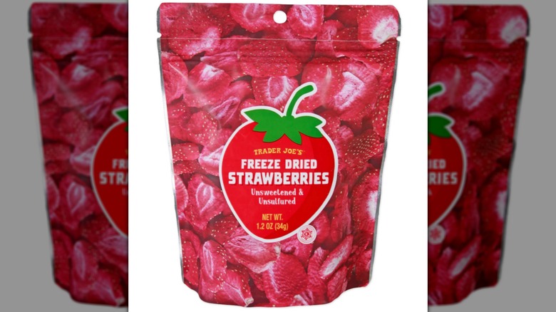 A bag of Trader Joe's Freeze Dried Strawberry Pieces on a white background