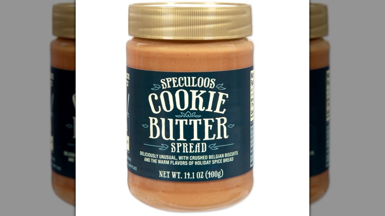 A jar of Speculoos Cookie Butter on a white background