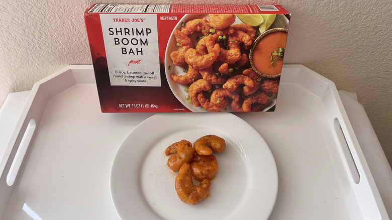 Trader Joe's Shrimp Boom Bah box with four cooked shrimps served on a plate