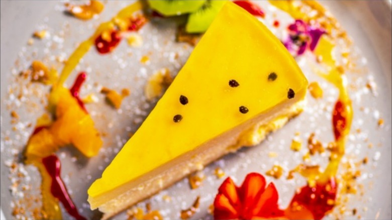 Slice of yellow passionfruit pie