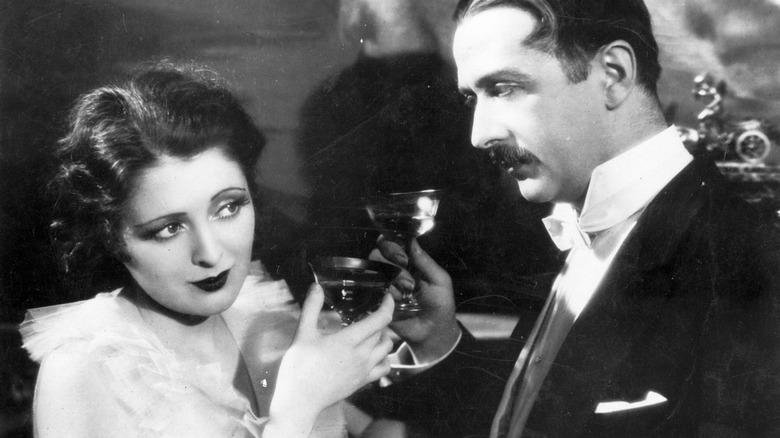 Billie Dove drinking champagne in 1927 American beauty