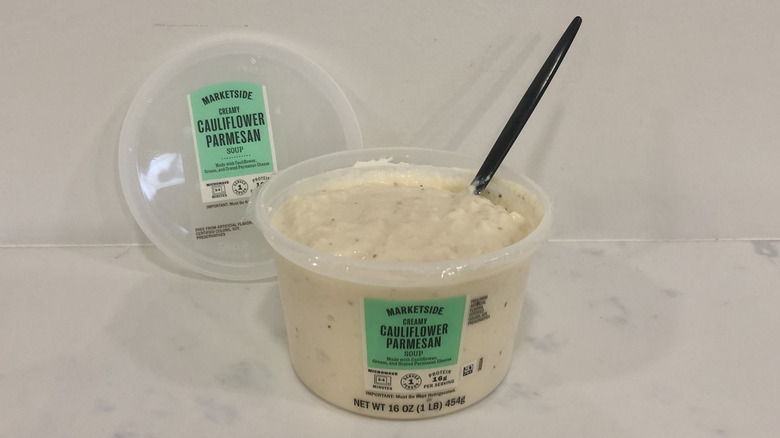 Walmart Marketside creamy cauliflower parmesan soup in a tub.