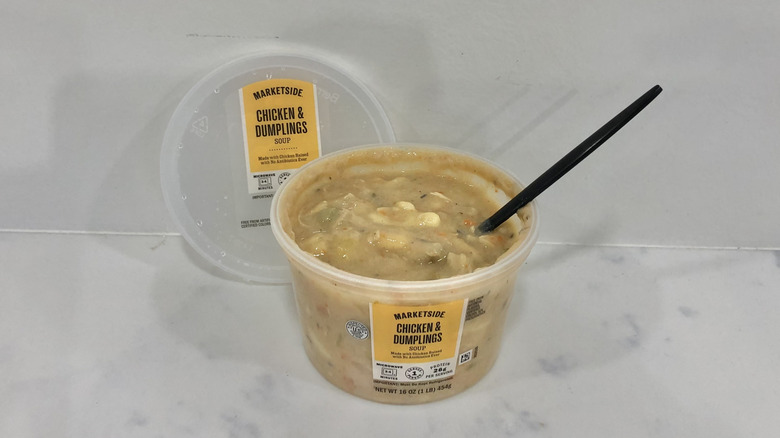 Walmart Marketside chicken & dumplings soup in a tub.