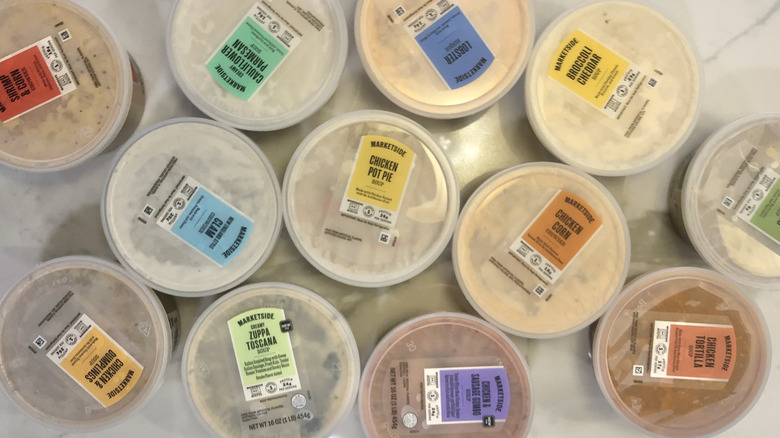 12 different Walmart Marketside soups in tubs.