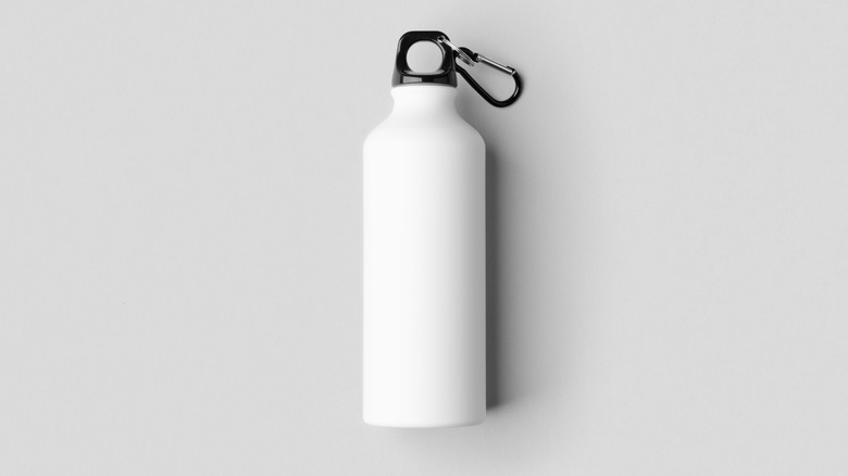 Reusable white water bottle on grey background