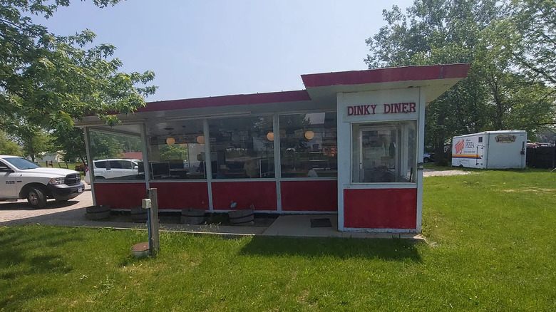 Exterior of red and white Dinky Diner in Decatur, IA