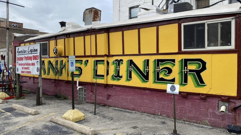Exterior of Frank's Diner painted yellow with green and black lettering