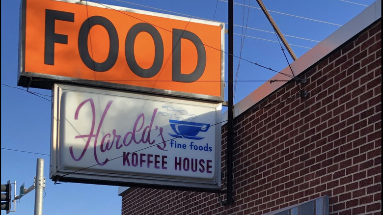 Orange and white signage outside Harold's Koffee House in Omaha, NE