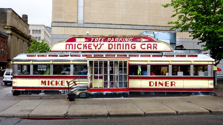 Exteior of red and yellow Mickey's Diner in St. Paul, MI
