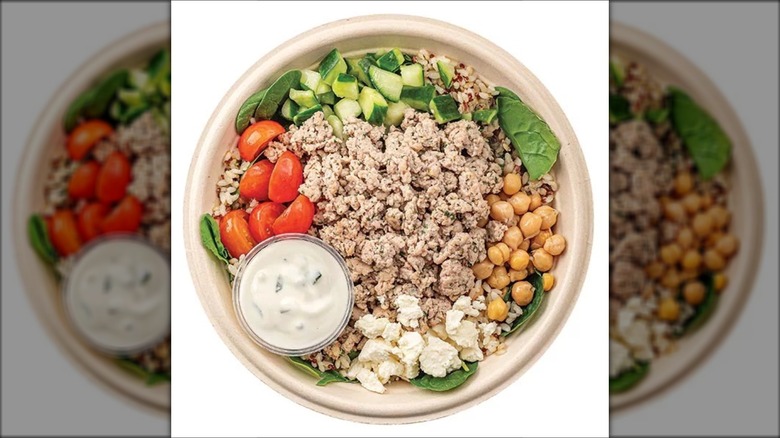 Wegmans Greek turkey bowl with chickpeas, tomatoes, ground turkey, feta, cucumbers, and tzatziki.