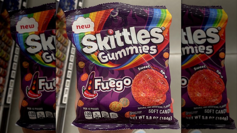 A purple package of Skittles Gummies Fuego