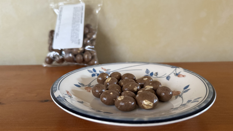 Oatmeal cinnamon raisins on plate in front of bag