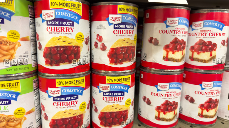 Cans of Comstock fruit filling used for cherry pie
