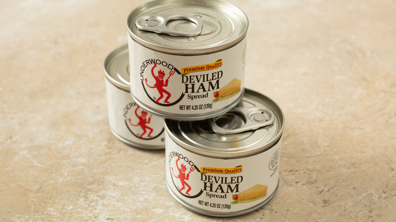 Three cans of Underwood Deviled Ham Spread