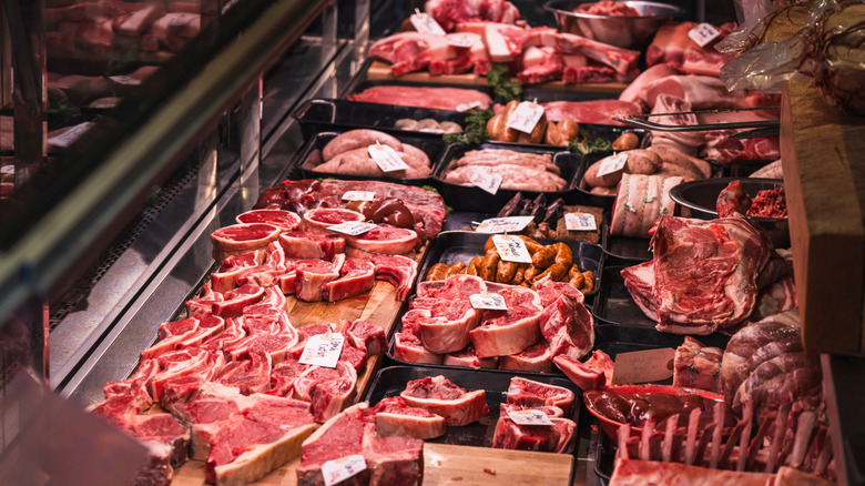 A butchery fridge display of various cuts of meat