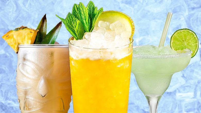 three tropical cocktails with ice