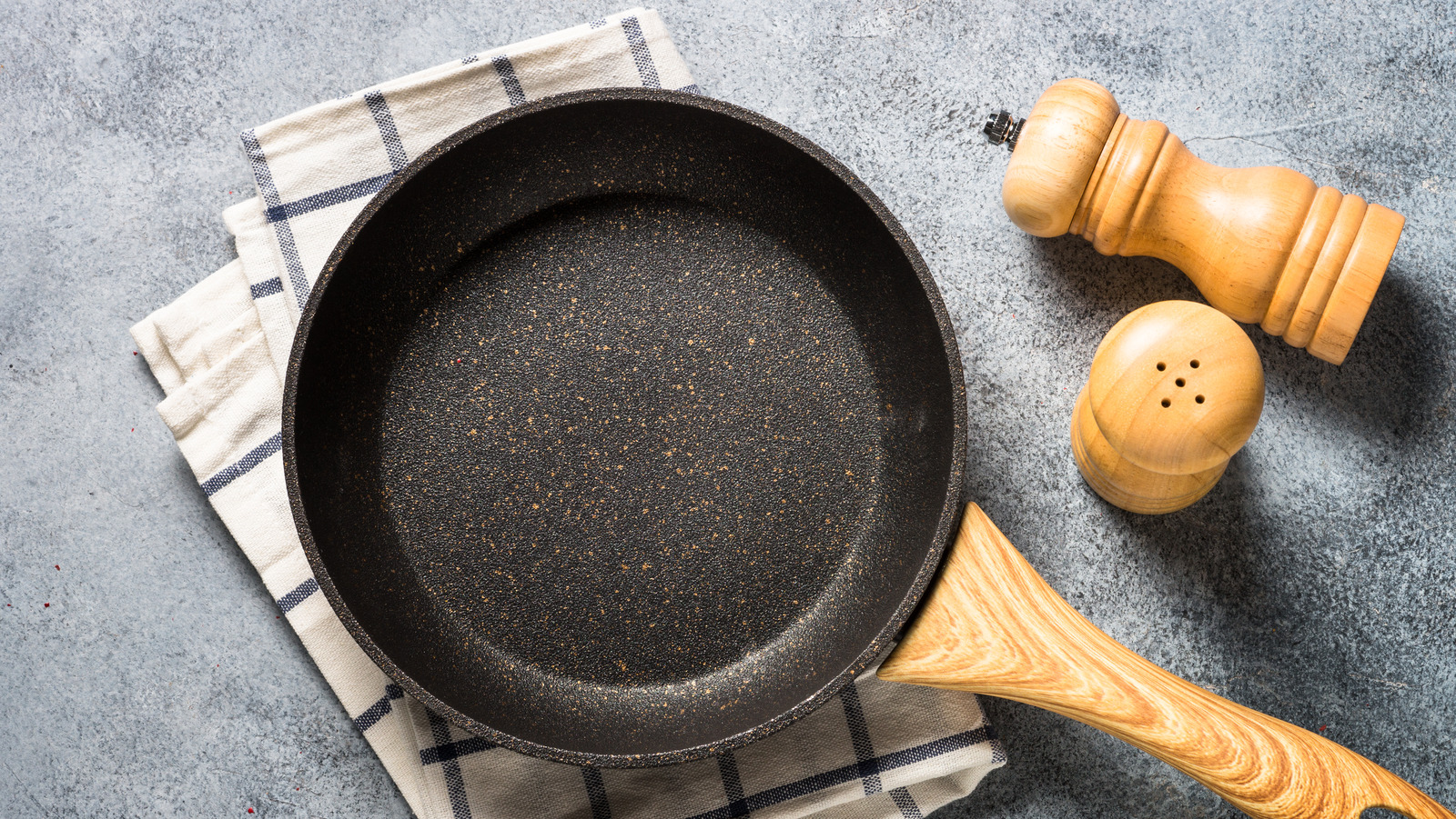 If my nonstick pans are scratched, do I need to throw them out?