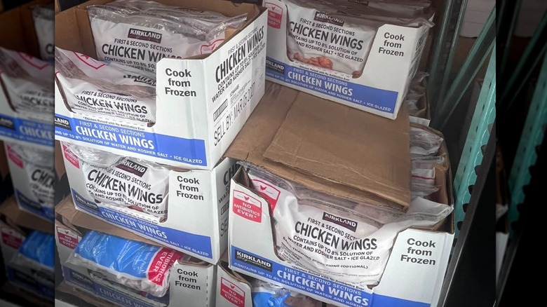Bags of Kirkland Signature Chicken Wings on display at Costco