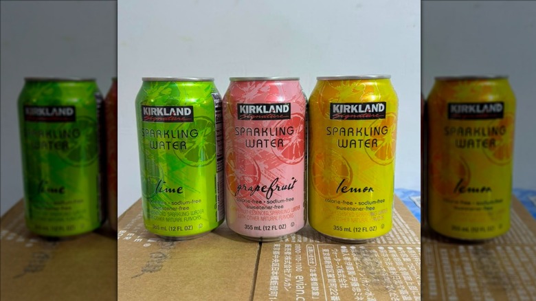Three cans of Kirkland Signature Sparkling Water