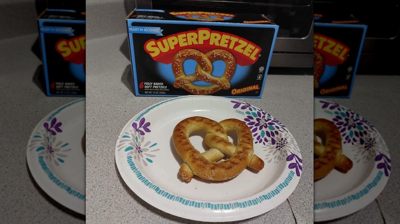 SuperPretzel Soft Pretzel on white paper plate