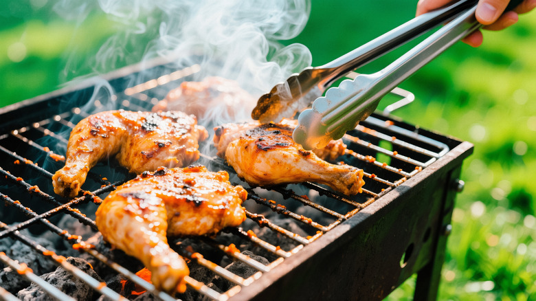 Spiced chicken thighs on grill