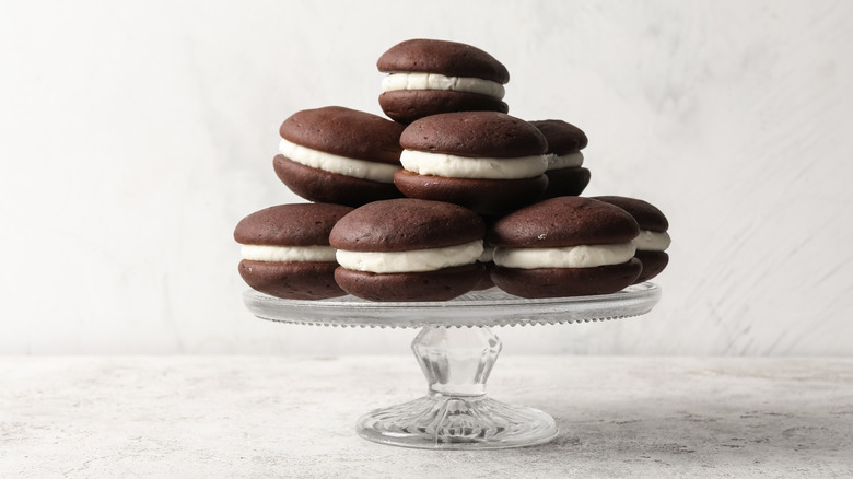 Whoopie pies arranged on cake stand