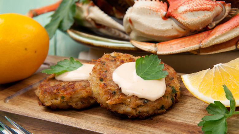 Dungeness crab cakes from the West Coast on a cutting board
