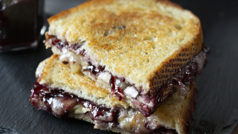 Grilled cheese with huckleberries on a table