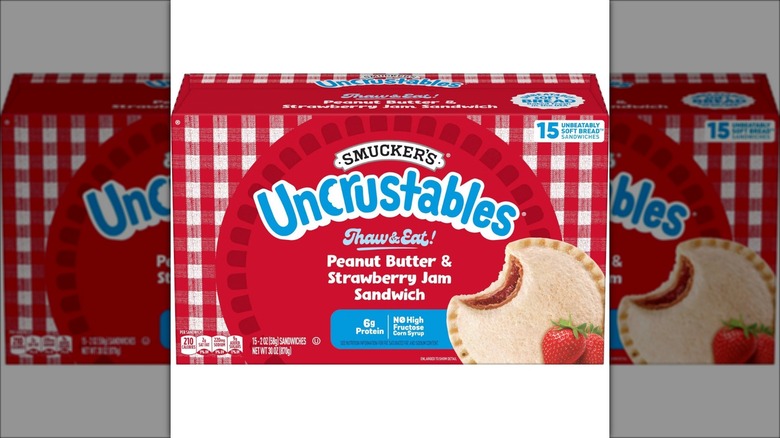 Box of Smucker's Uncrustables peanut butter & strawberry jam sandwich