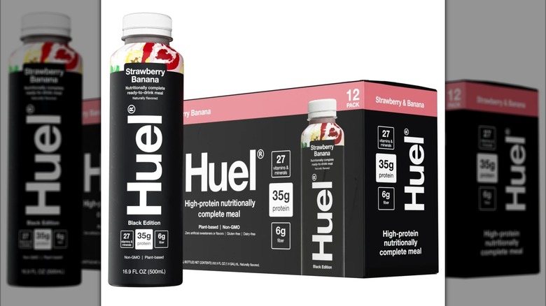 Box and bottle of Huel High-Protein Strawberry Banana Meal Replacement Drinks