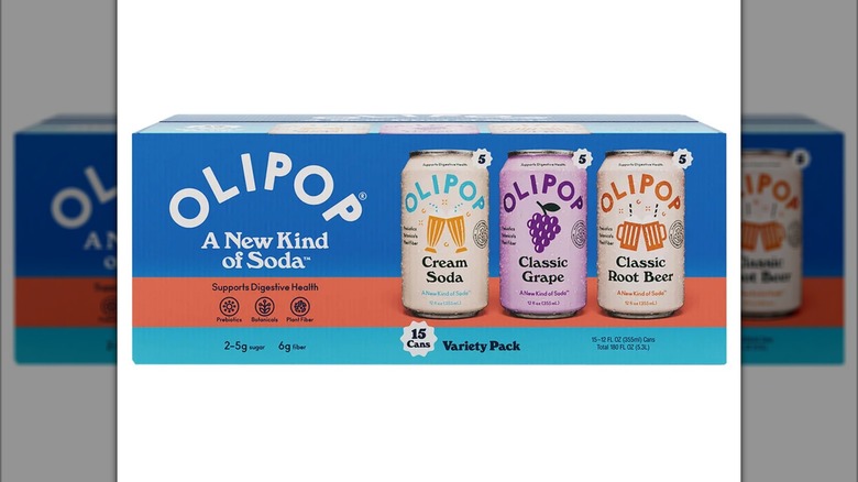 Blue box of Olipop Soda Variety Pack with grape, root beer, and cream soda flavors from Costco