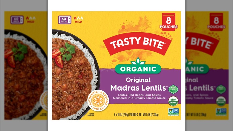 Yellow box of Organic Tasty Bite Madras Lentils with product photo
