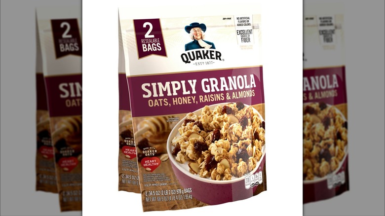 Two bags of Quaker Simply Granola on white background