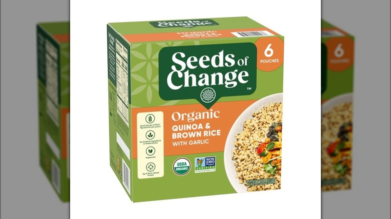 Green box of Seeds of Change Organic Quinoa and Brown Rice with Garlic pouches