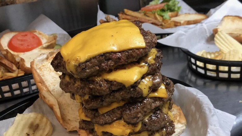 Cheese burger on white paper