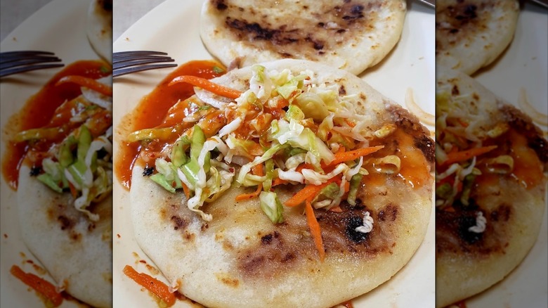 Papusas with curtido on top