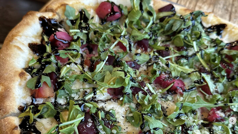 Close-up pizza with arugula