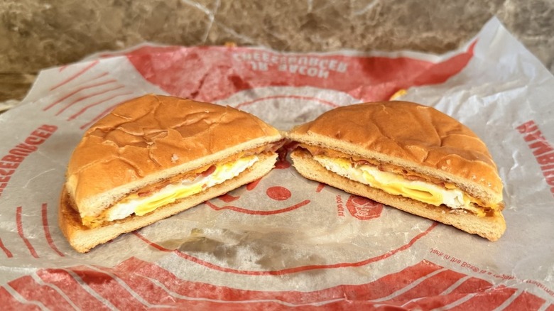 Jack in the Box Bacon Breakfast Jack sandwich cut in half