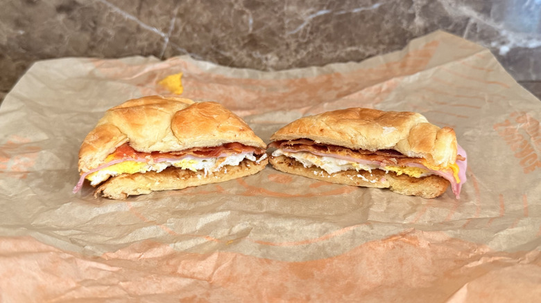 Jack in the Box Supreme Croissant sandwich cut in half